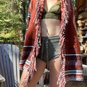 Long fringe Western-style patterned sweater